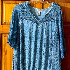 Catherine's light denim color top. Lightweight runs smaller